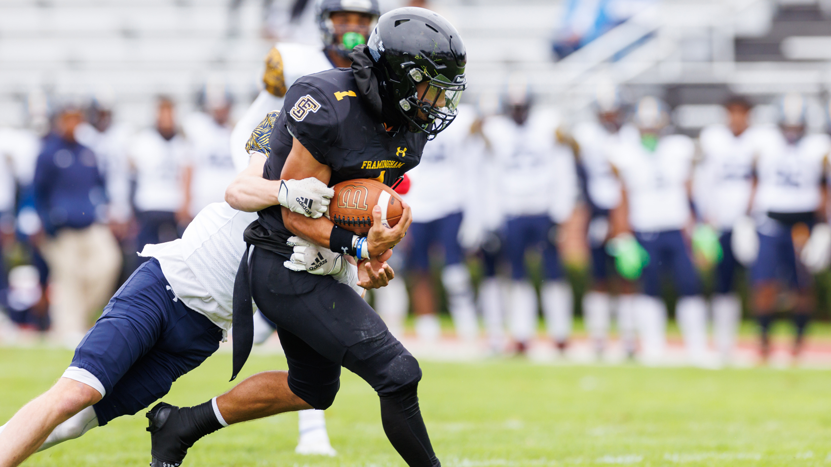 Football Sails Past Mass. Maritime 28-3
